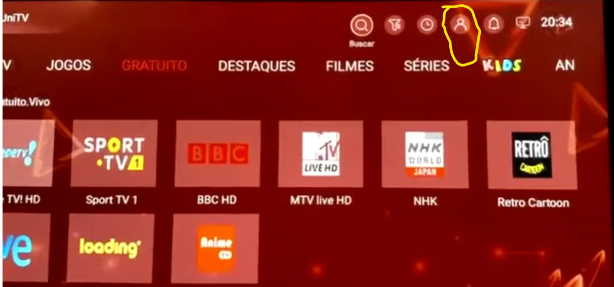Tela inicial do app UniTV na TV com o ícone de Perfil destacado no canto superior direito